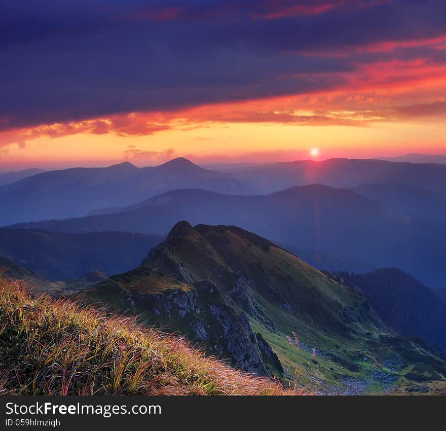 Landscape with a beautiful sunrise in the mountains