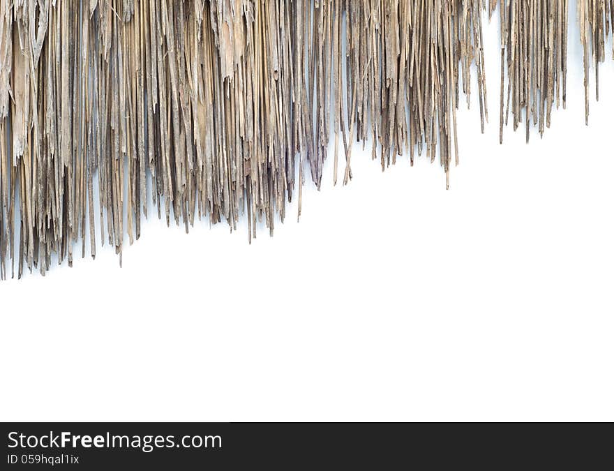 The old roof made of grass on white background. The old roof made of grass on white background