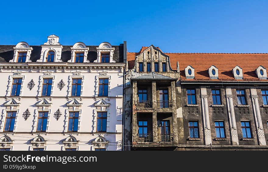 Destroyed and renovated facades of old tenements in Katowice, Silesia, Poland.