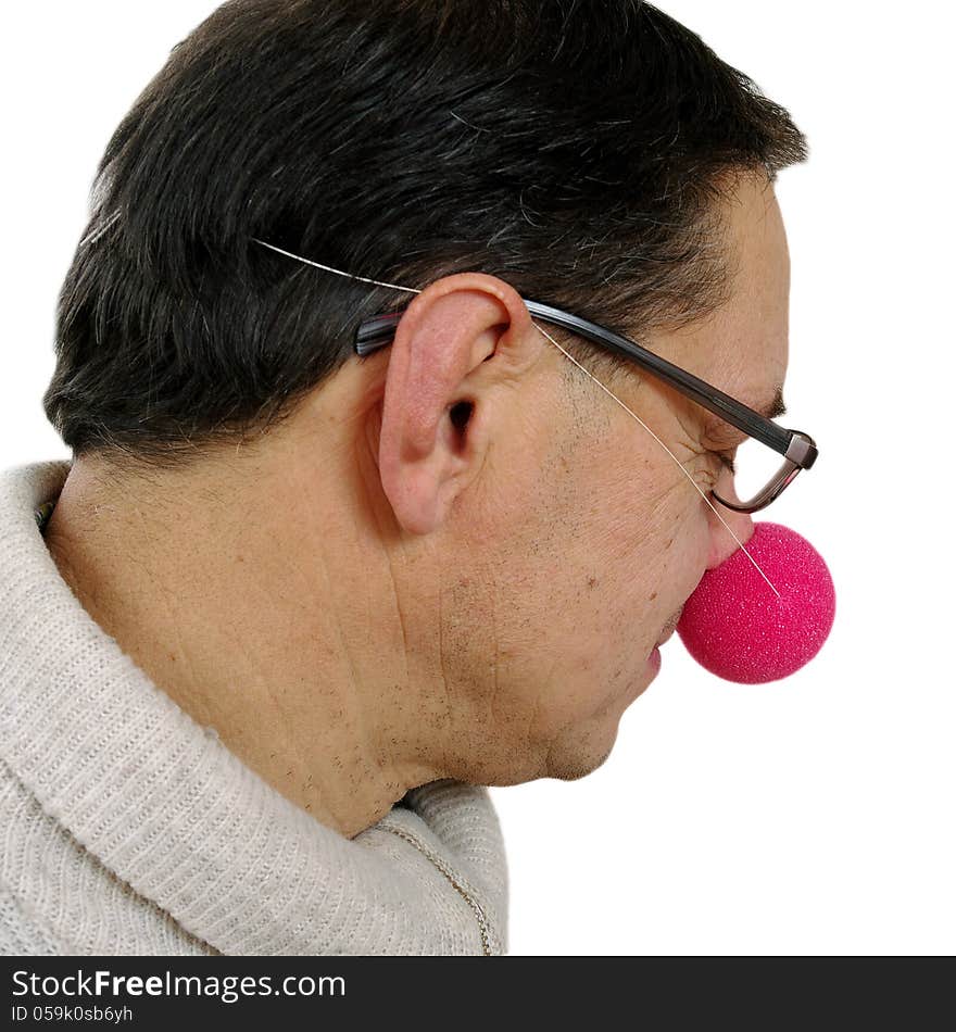 Clown with red nose isolated on white surface. Clown with red nose isolated on white surface.