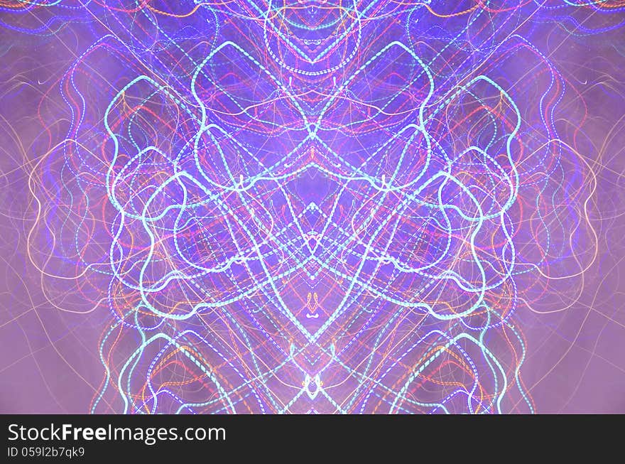 Photo of light trails in motion. Abstract symmetry. Photo of light trails in motion. Abstract symmetry.