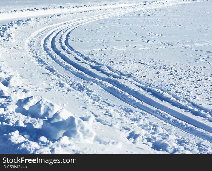 Nordic skiing trails curve snowy winter sports track. Nordic skiing trails curve snowy winter sports track