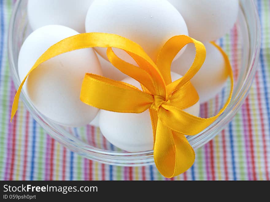 Easter eggs in glass bowl. Easter eggs in glass bowl