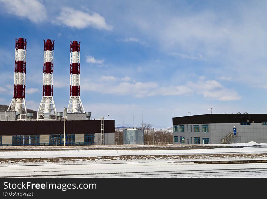 Power plant pipes against the blue sky