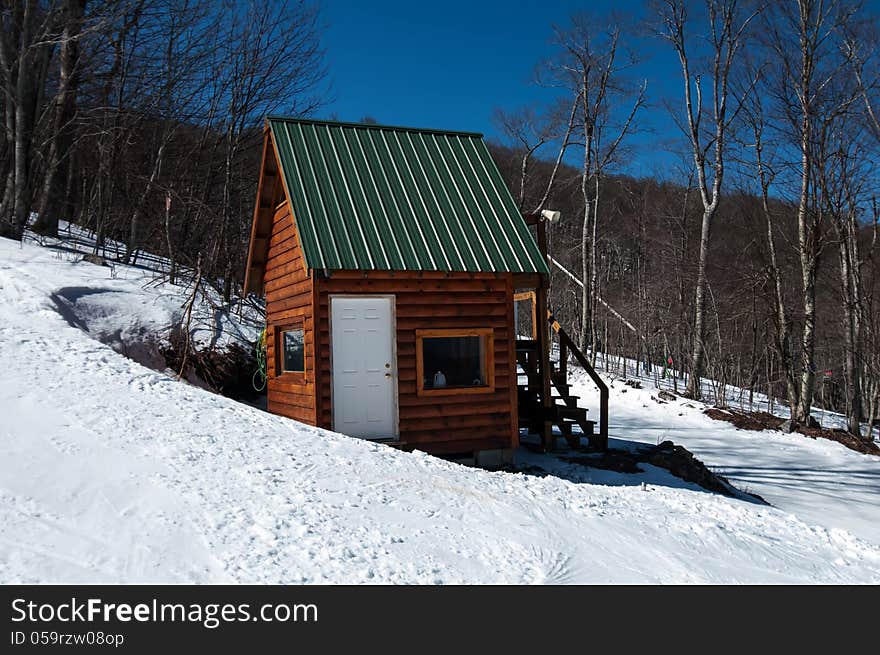 Mini log cabin in mountain forest with snow. Mini log cabin in mountain forest with snow