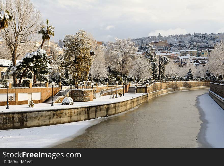 Snow storm with slush on sidewalks. Granada