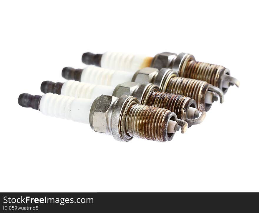 Used spark plug isolated on white background