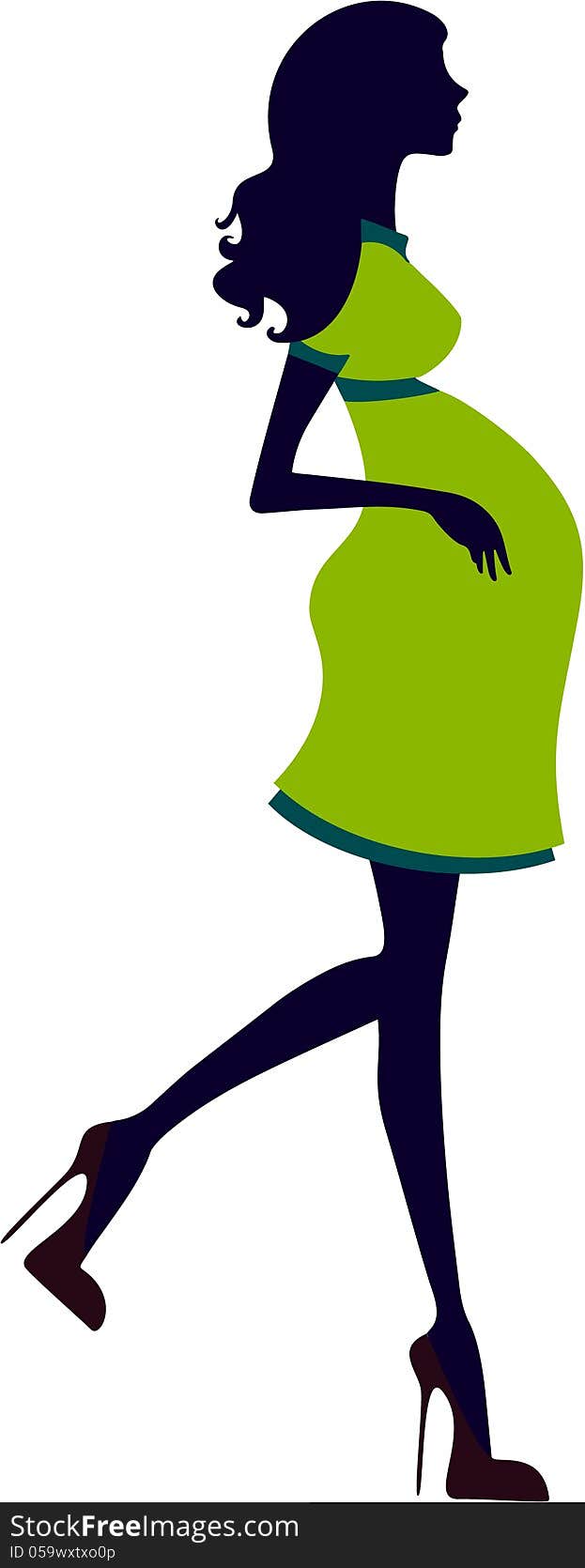 Silhouette of pregnant woman with green dress