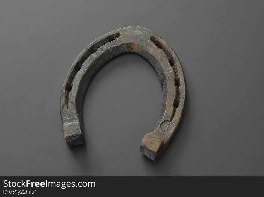 Rusty horseshoe for a young horse