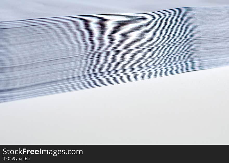 Stack of envelopes on white background