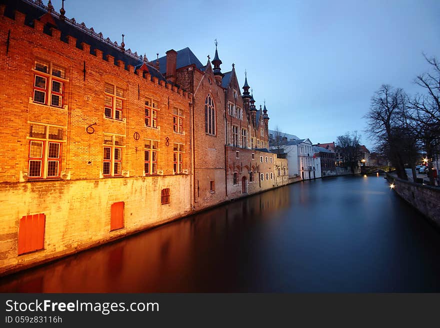 Traditional Houses Reflected In The Water Canals From Bruges &x28;Brugge&x29; - Belgium.