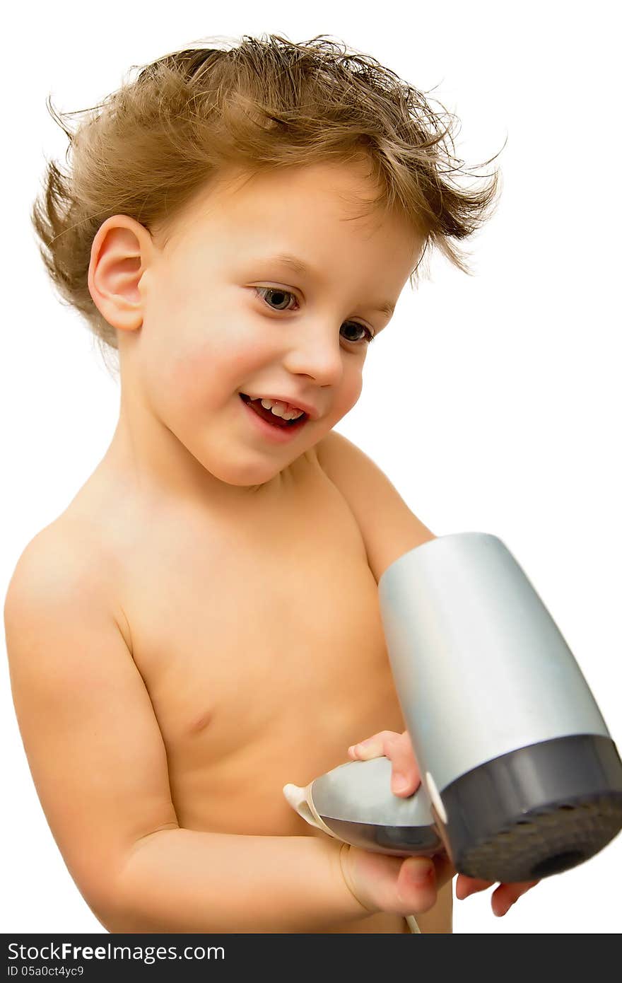 Baby boy with toy hair dryer over white