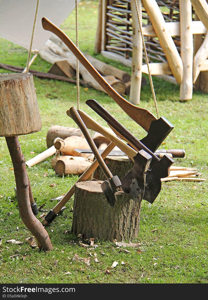 A Collection of Axes at a Wood Crafting Display. A Collection of Axes at a Wood Crafting Display.