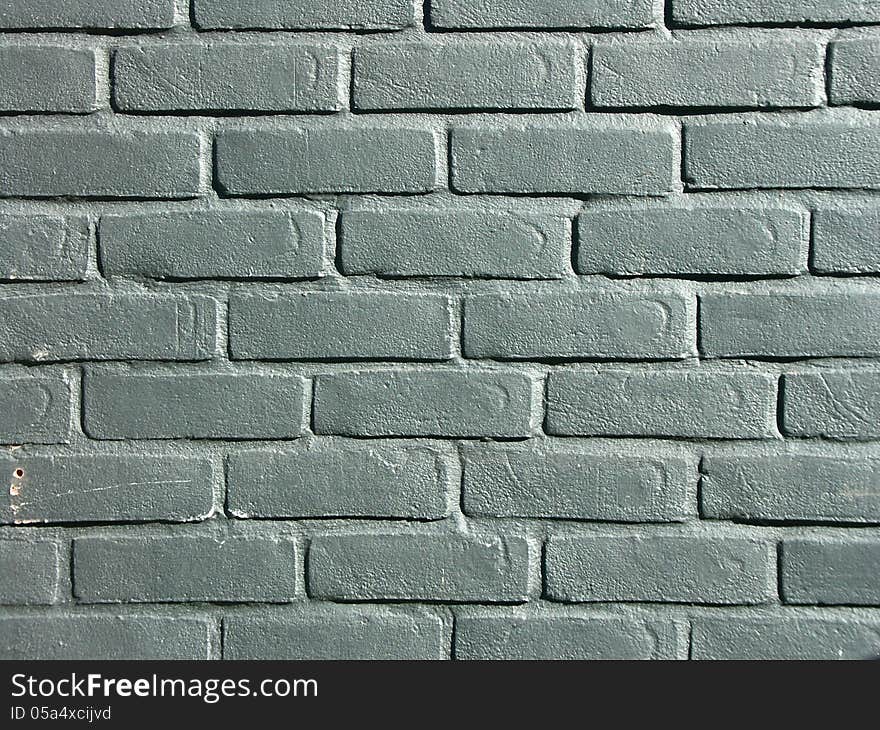 Close up of section of grey painted brick wall. Close up of section of grey painted brick wall