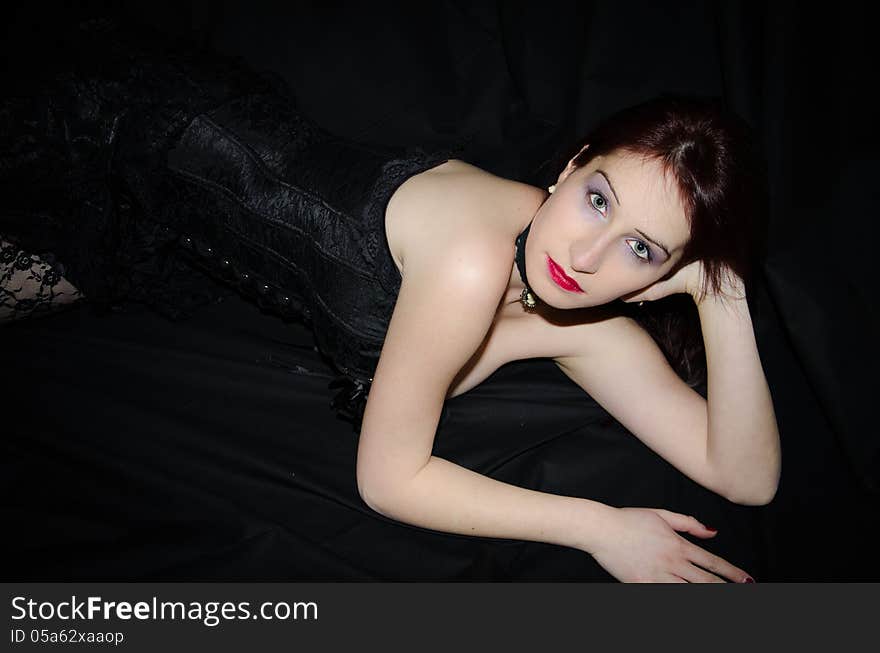 Portrait of hot woman isolated on black background.