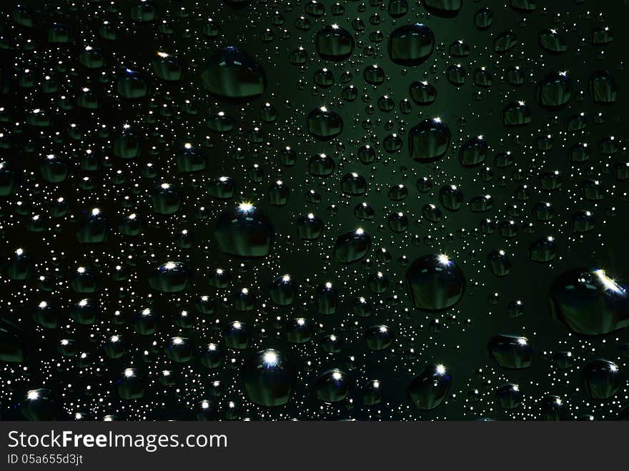 Abstract water drop with down light background