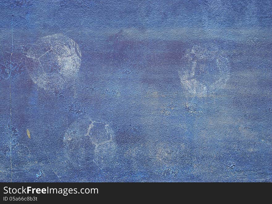 The old blue wall with ball print texture background