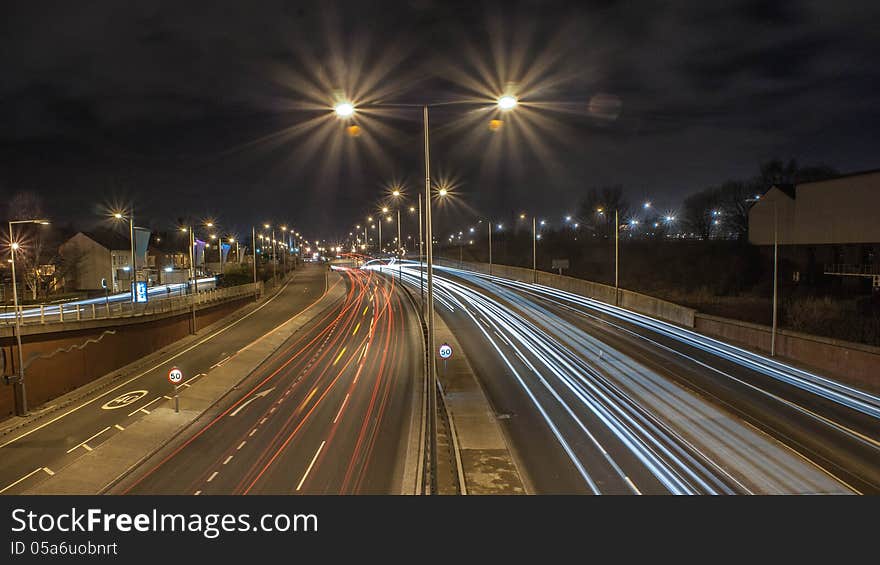 Light trails through a town