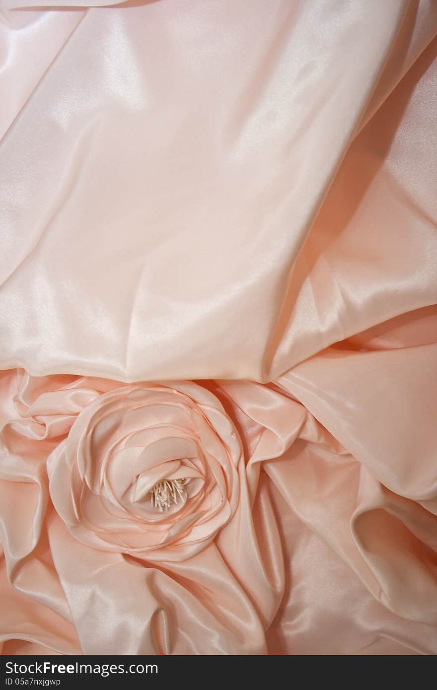 A material rose detail on a wedding dress. Image can also be used for formal nightgown. A material rose detail on a wedding dress. Image can also be used for formal nightgown.