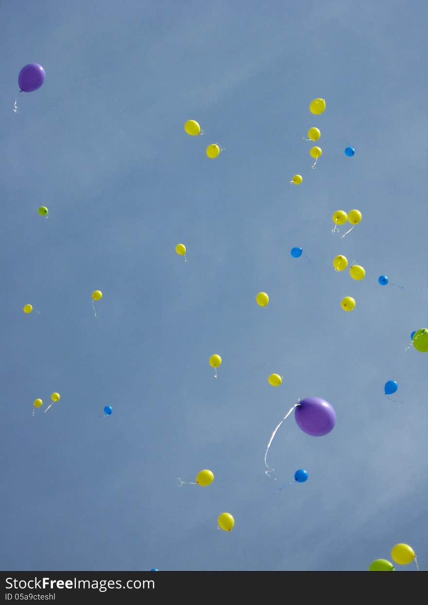 Image of color balloons flying away to the sky