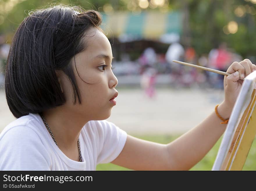 Girl Painting In In The Park