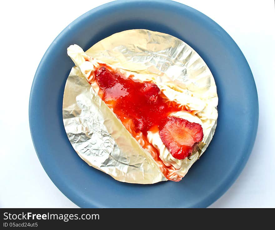 Strawberry cake on the blue dish