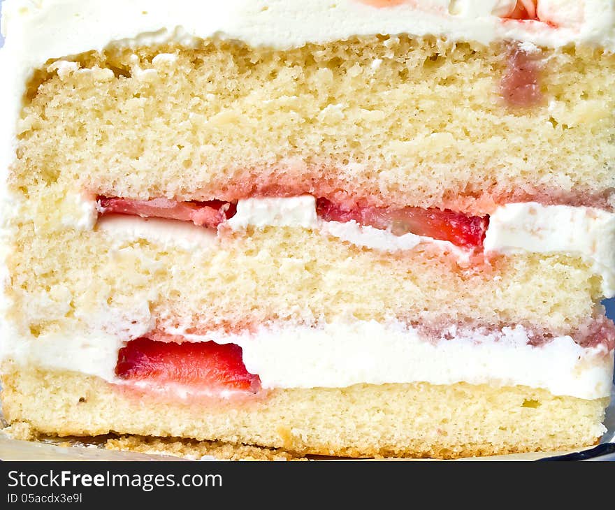 The layer of strawberry cake