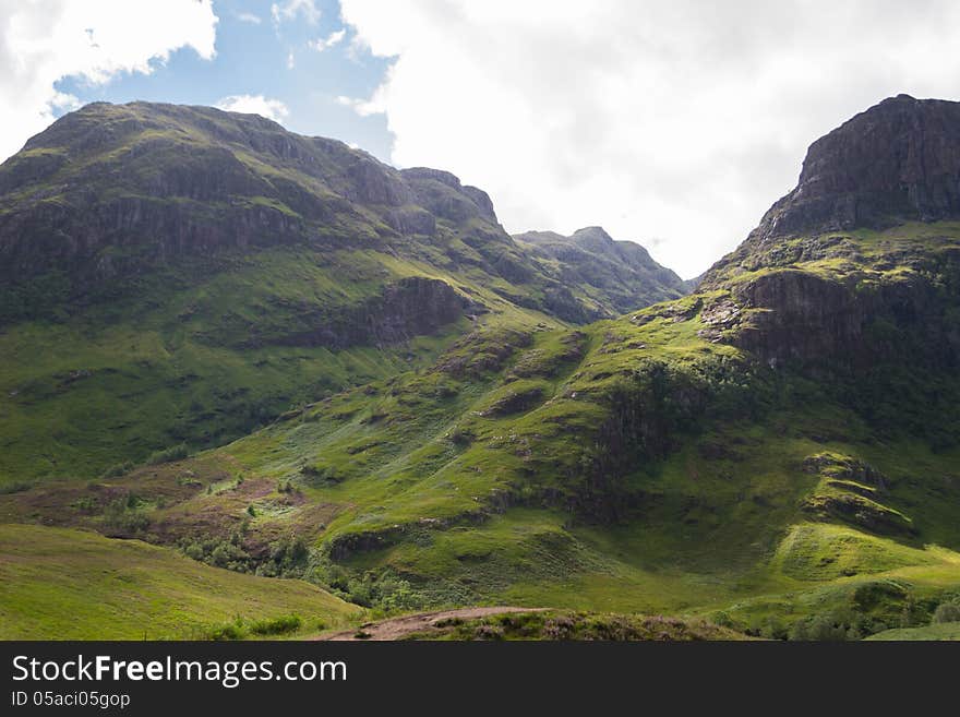 Scottish landscape in highlands near Fort William. Magnificient green mountains. Scottish landscape in highlands near Fort William. Magnificient green mountains