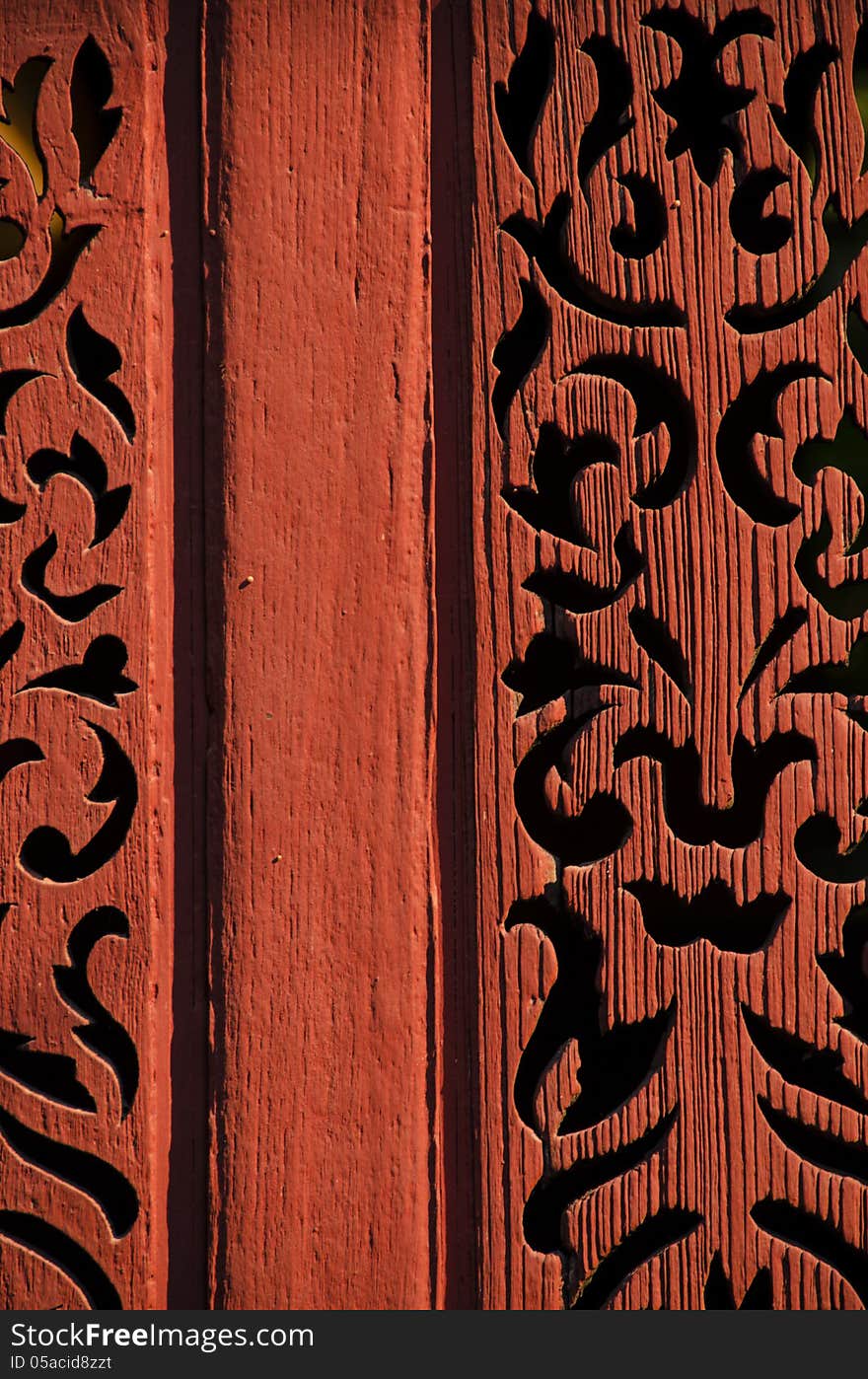 Wood door carvings with red paint. Wood door carvings with red paint