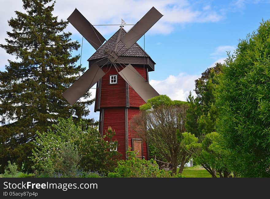 Old wooden windmill in countryside. Gorizontal frame