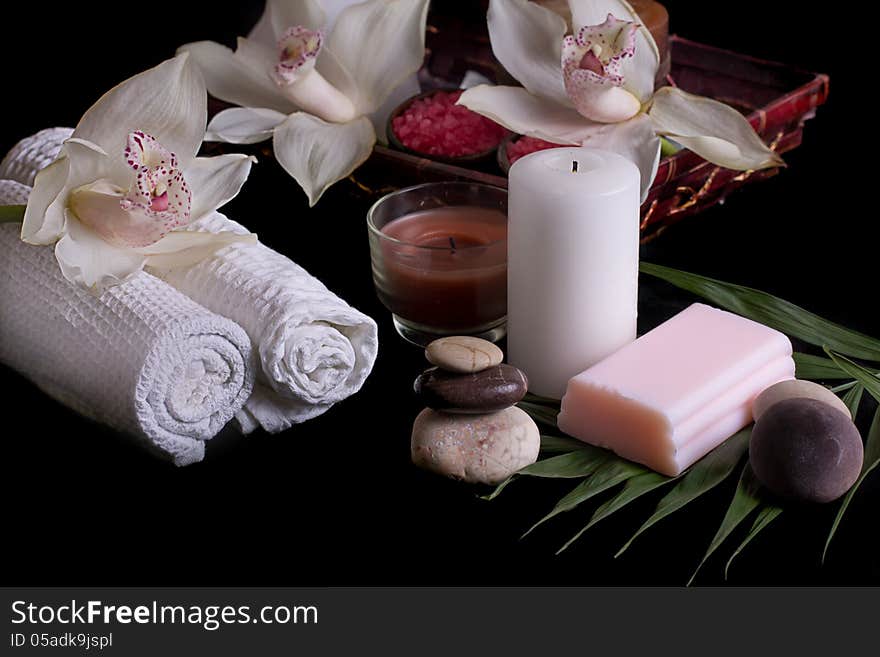 White orchids, spa products in wooden box