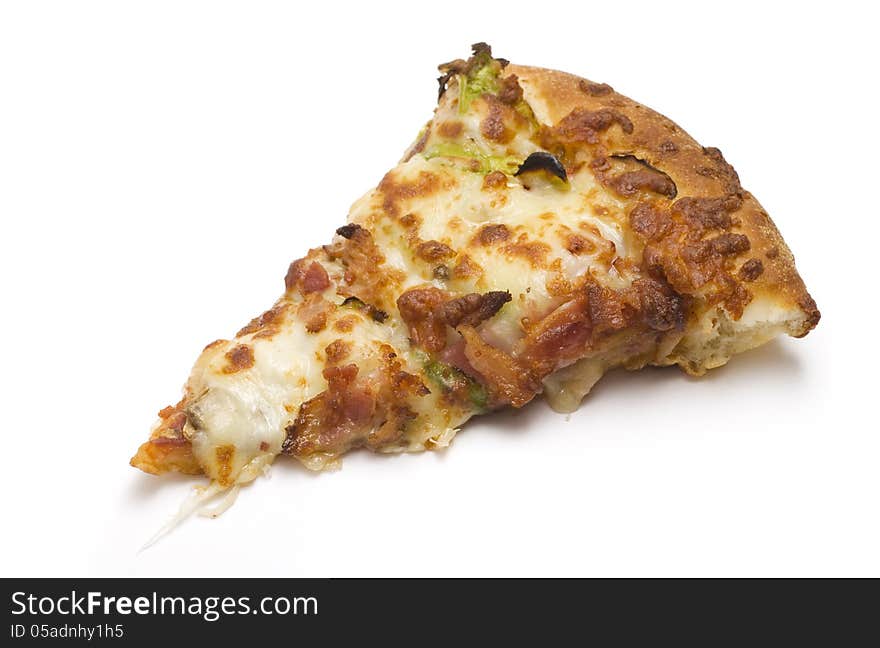 Piece of a combination pizza isolated on a white background. Piece of a combination pizza isolated on a white background.