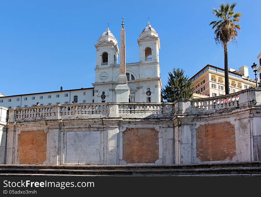 View of the church of Trinita dei Monti and the obelisk in front of her from the Spanish Steps, Rome, Italy. View of the church of Trinita dei Monti and the obelisk in front of her from the Spanish Steps, Rome, Italy