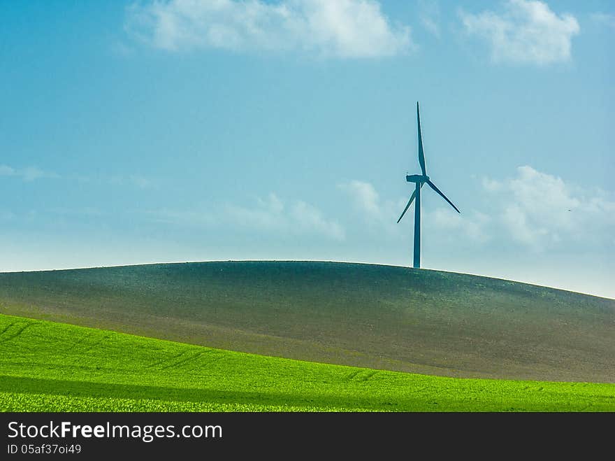 A windmill in the countryside horizon. A windmill in the countryside horizon