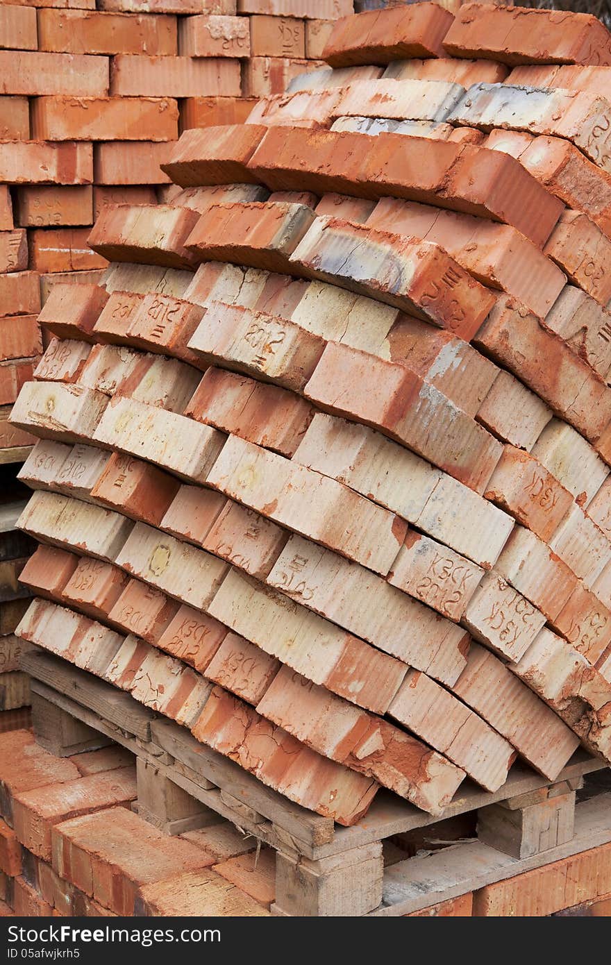 Bricks for next building on wooden pallet