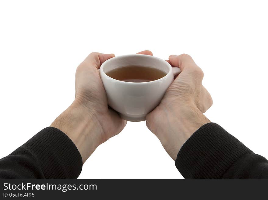 Man's hands holding cup of tea isolated on white background. Man's hands holding cup of tea isolated on white background