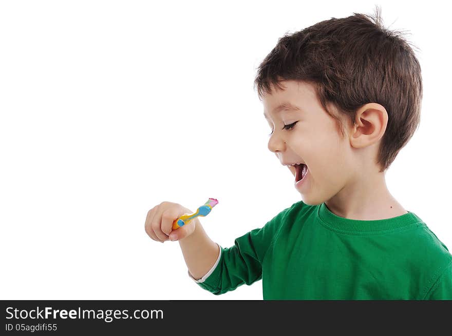 White boy is brushing his teeth. White boy is brushing his teeth.