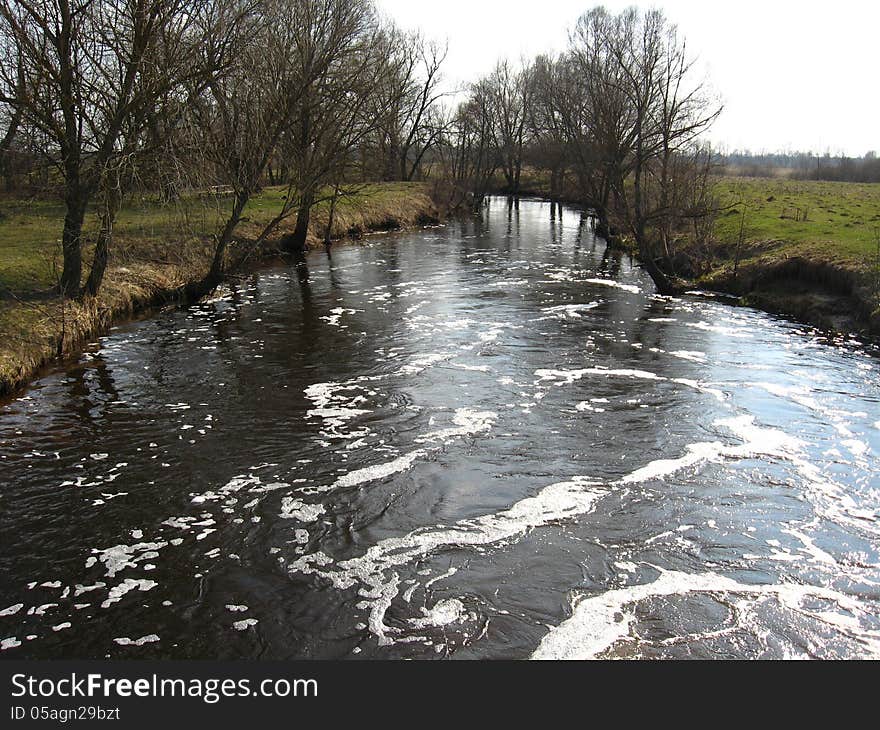 The image of flood on the river in the spring. The image of flood on the river in the spring