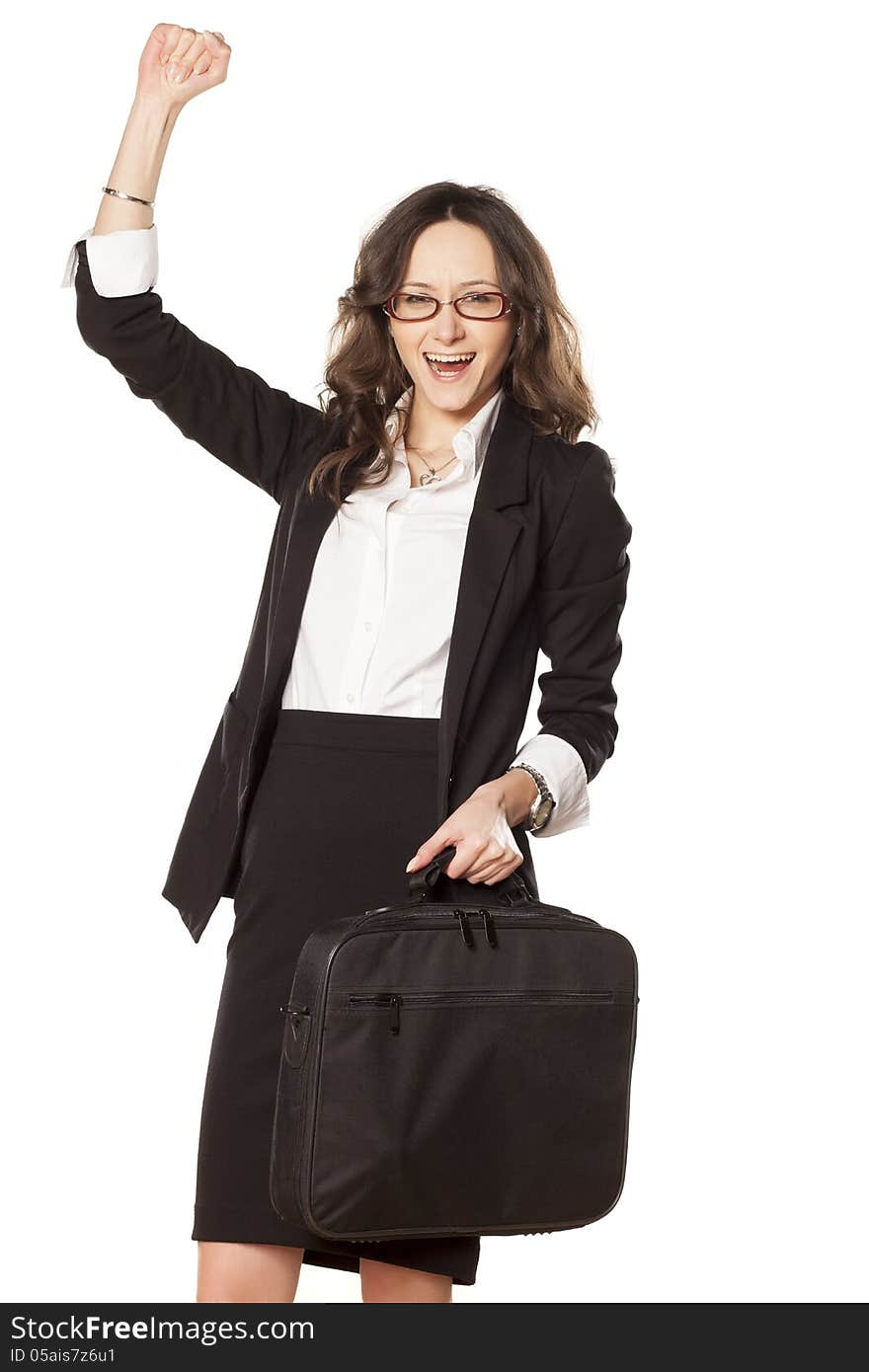 Nice business woman with laptop bag exulting with a hand up. Nice business woman with laptop bag exulting with a hand up