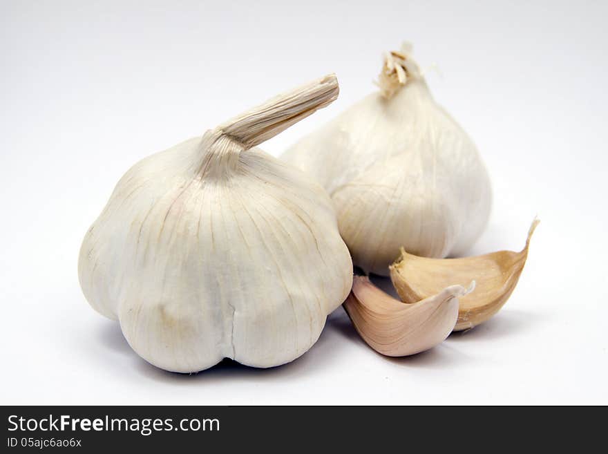 Garlic against white background.