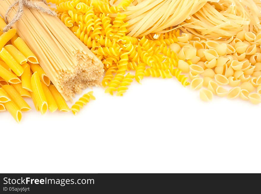 Different types of pasta on white