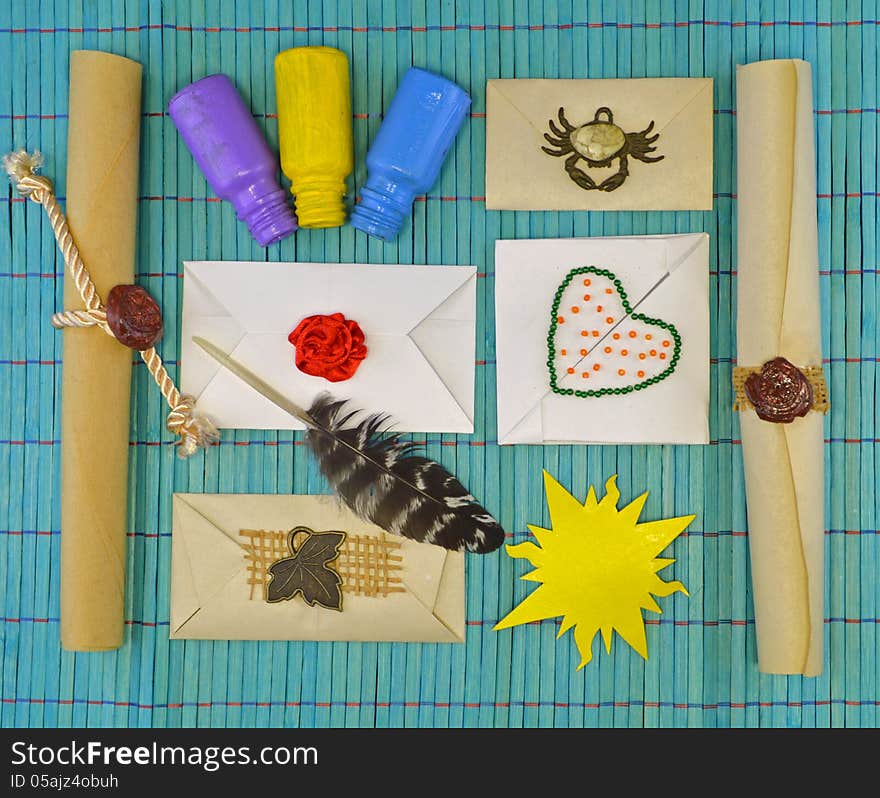 Paper envelopes and scrolls with decorations. Paper envelopes and scrolls with decorations