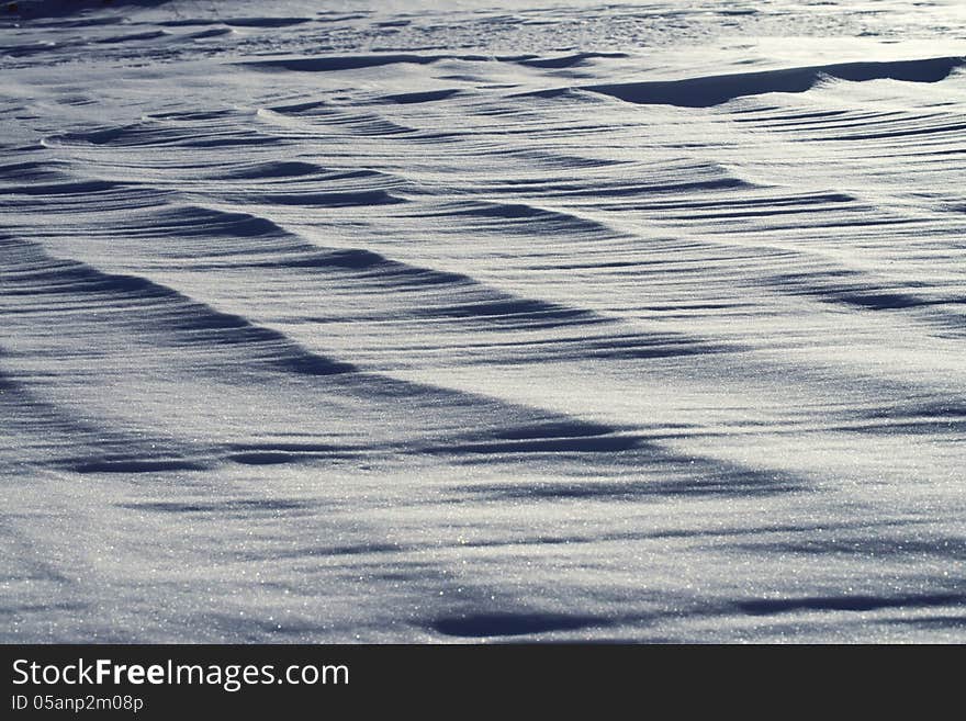 Textural background in the form of a snow field