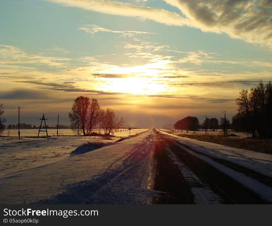 Sunset over the road