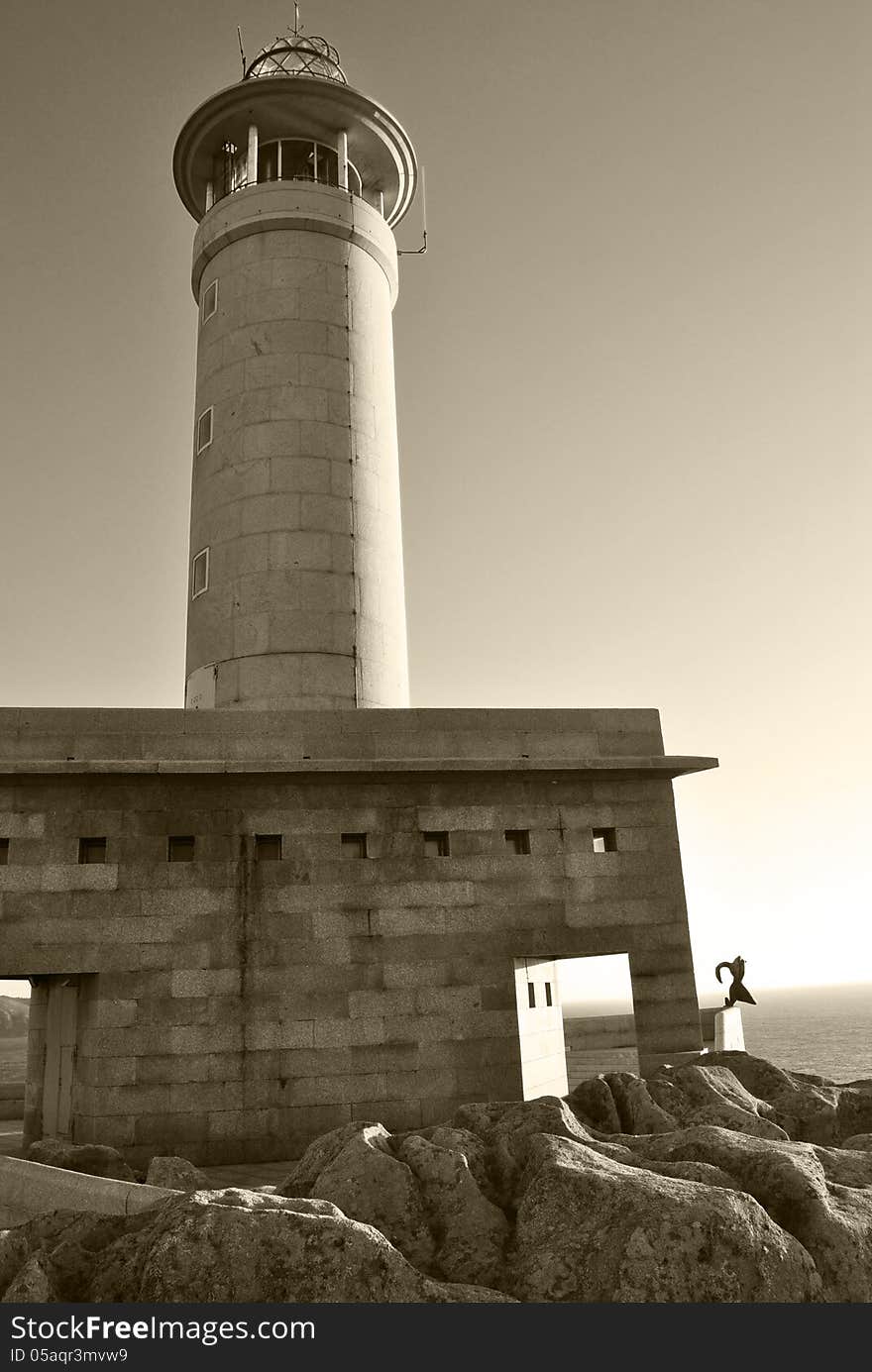 Lighthouse on the background of the sea. Lighthouse on the background of the sea