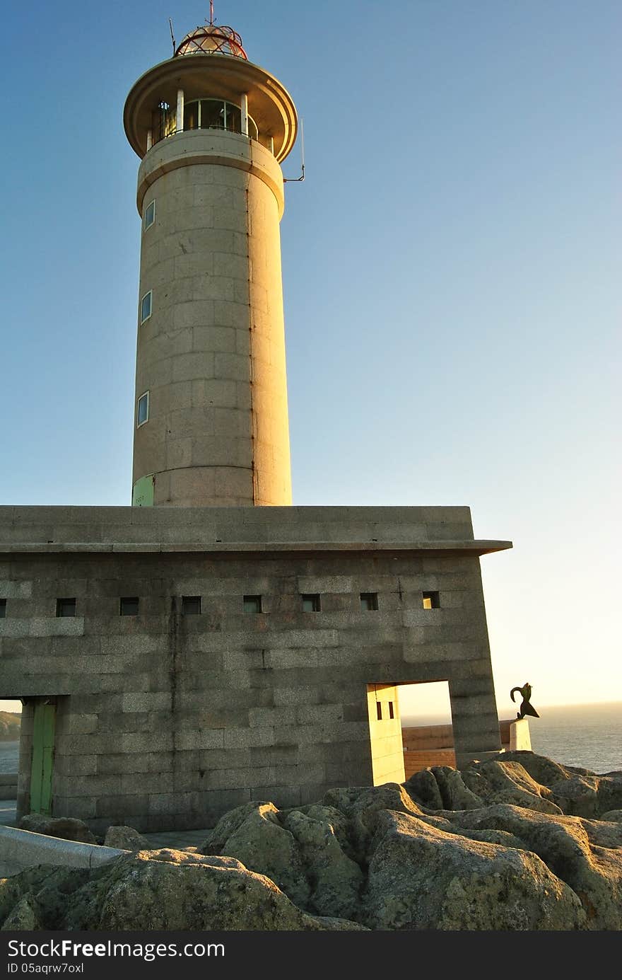 Lighthouse on the background of the sea. Lighthouse on the background of the sea