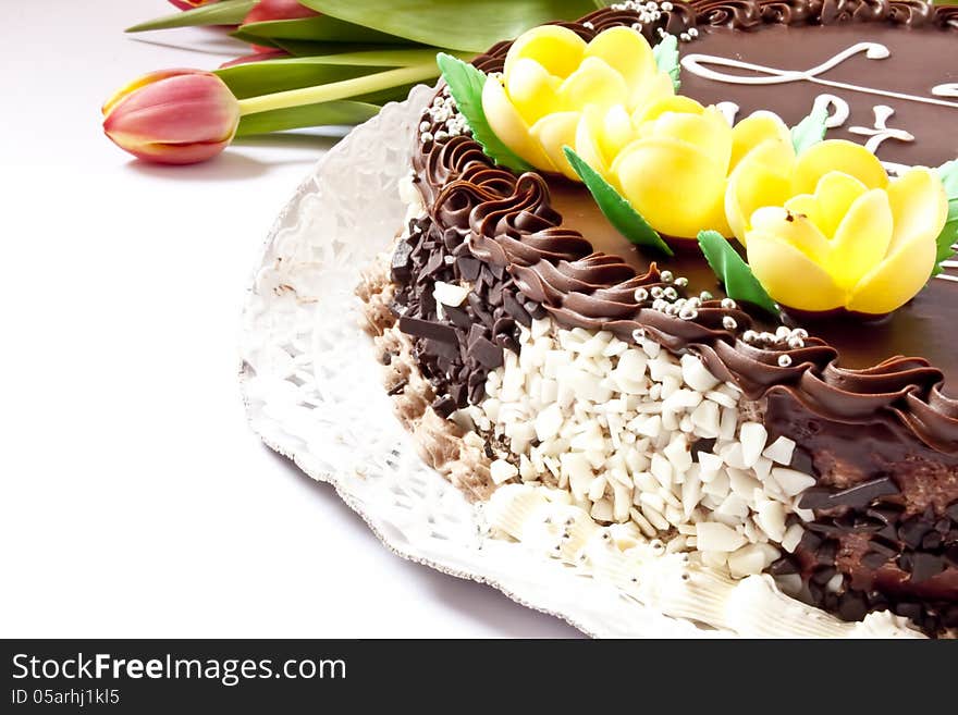 Sweet cake with chocolate and edible decoration of marzipan. Sweet cake with chocolate and edible decoration of marzipan