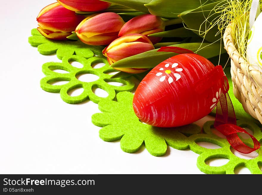 Colorful decorated easter eggs and fresh tulips. Colorful decorated easter eggs and fresh tulips