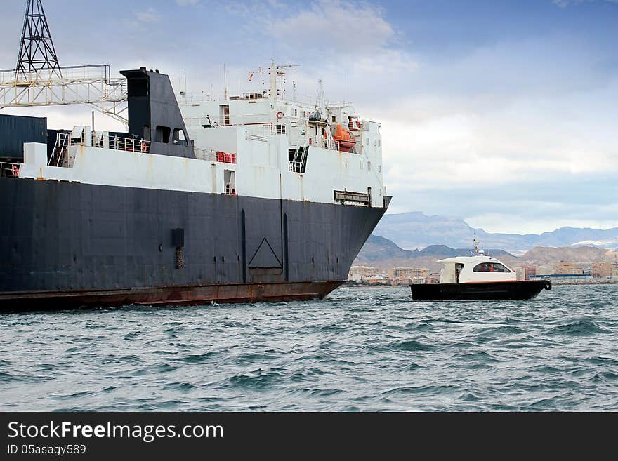 General cargo ship and pilot cutter