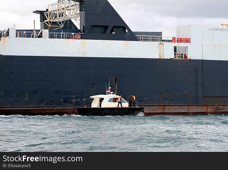 General cargo ship and pilot cutter